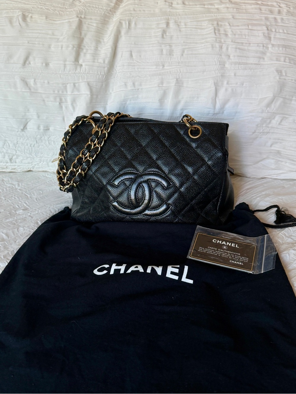 CHANEL Black Quilted Caviar Leather Petite Timeless Shoulder Bag with Gold Chain